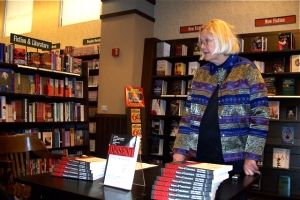 Ann Wright signing books